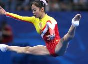 中国女子体操队夺得奥运会团体铜牌，杨云在比赛中