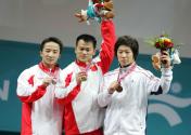 多哈亚运会举重赛次日 张国政夺得男子69公斤级金牌