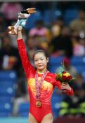 程菲获多哈亚运会体操比赛女子跳马金牌