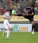 东亚杯男足赛首轮 中国队3比3平日本队