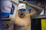 首届青运会游泳赛 覃海洋夺男100蛙冠军